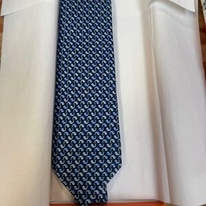 This HERMES Paris neck tie dark blue with a with multi geo print NIB